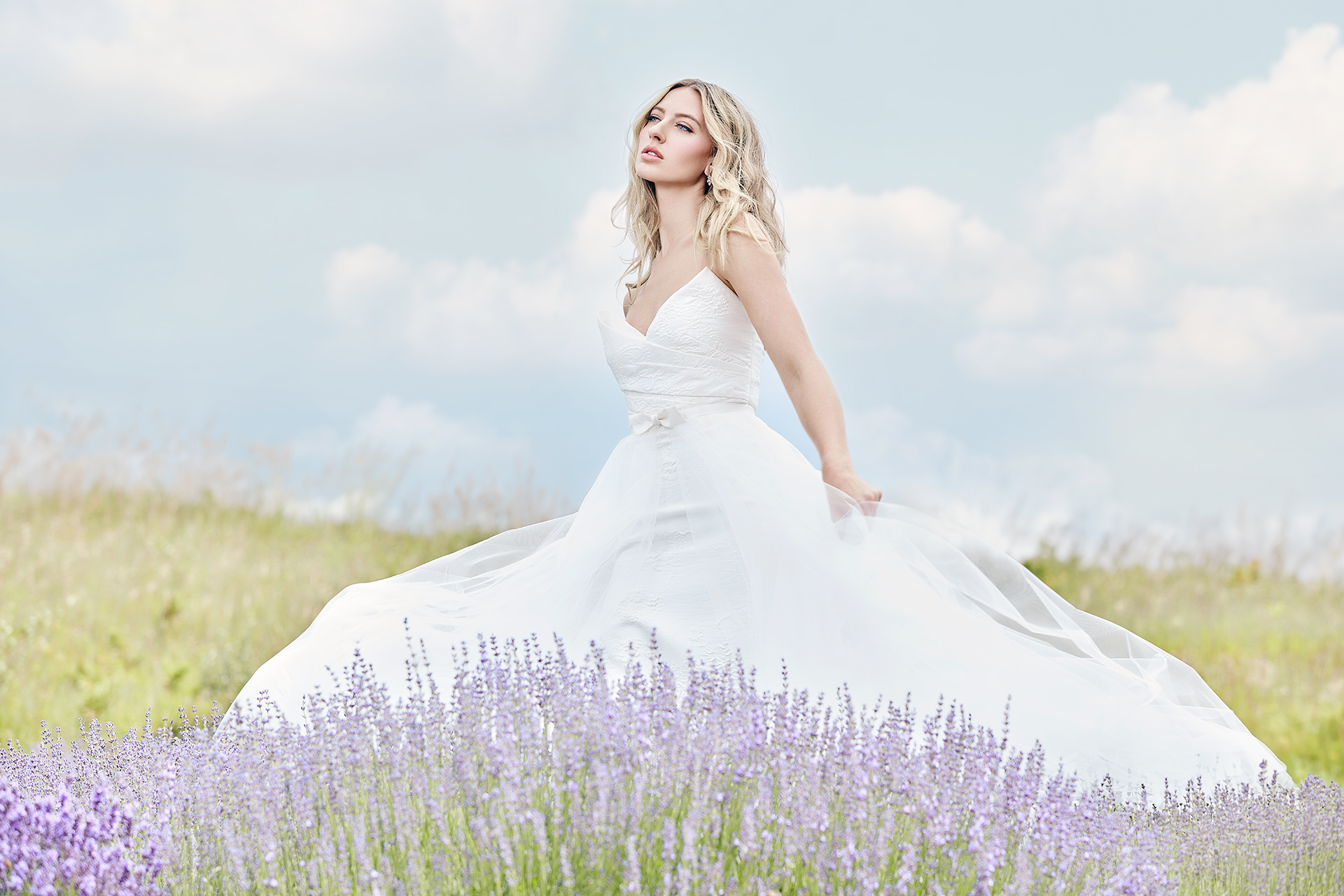 Lians' bridal editorial Hair & Makeup by Monica Jadan: a sun-kissed bride in a ruffled gown at Lavender Hills Farm, Michigan.