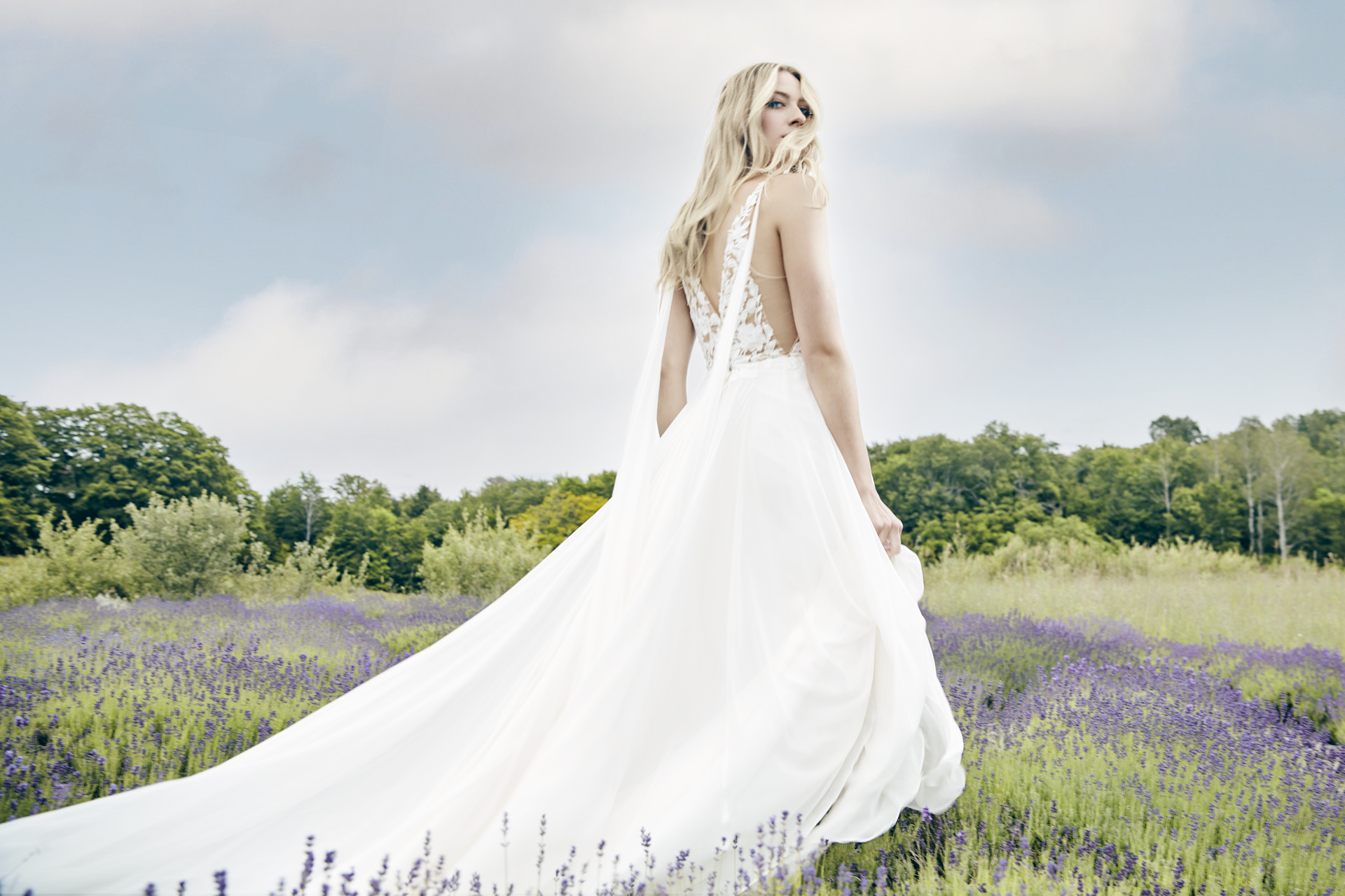 Lians' bridal editorial Hair & Makeup by Monica Jadan: a sun-kissed bride in a ruffled gown at Lavender Hills Farm, Michigan.