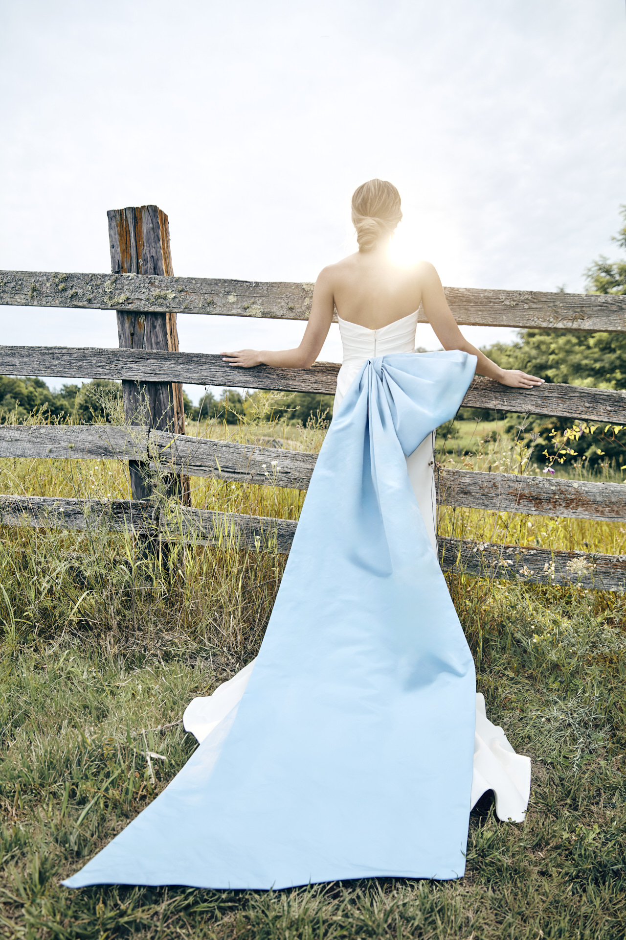Lians' bridal editorial Hair & Makeup by Monica Jadan: a sun-kissed bride in a ruffled gown at Lavender Hills Farm, Michigan.